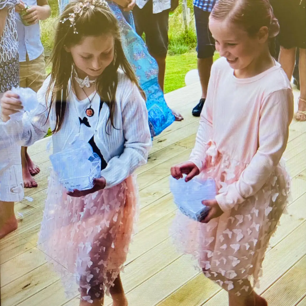 Flower girls walking down the aisle