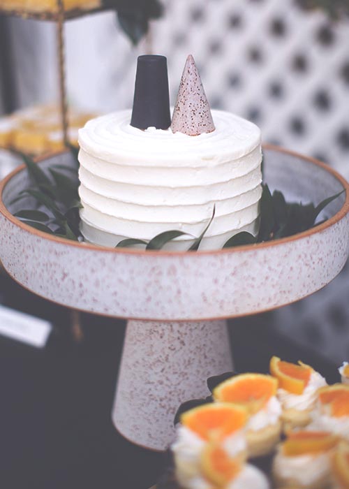 Wedding cake on a ceramic cake stand